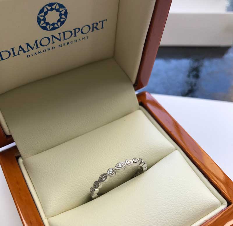 A vintage inspired bezel set diamond eternity ring