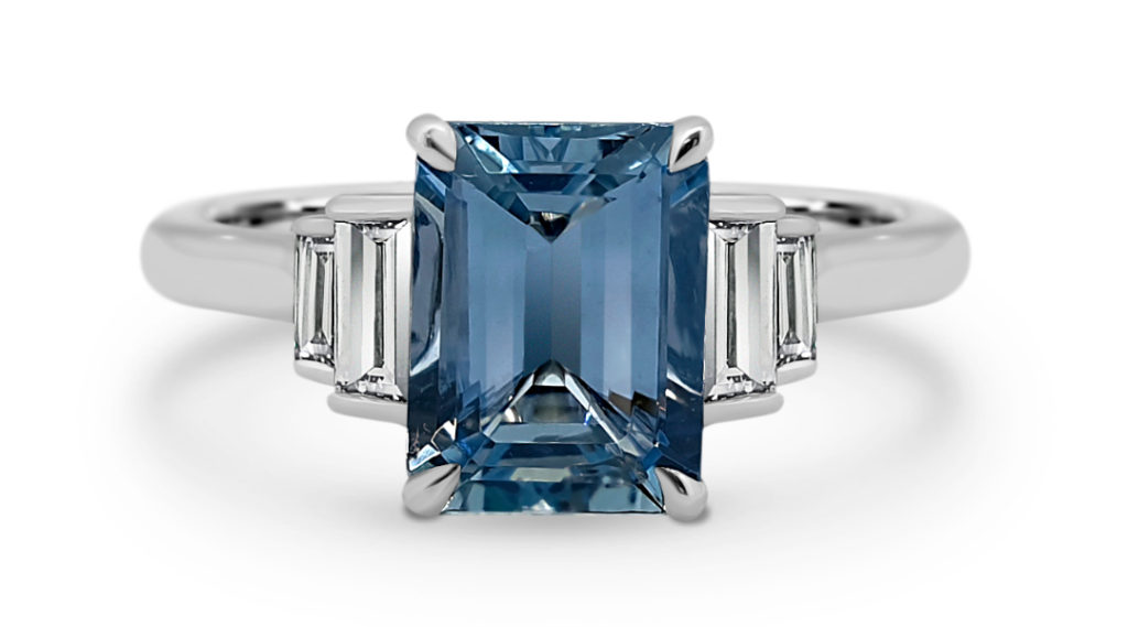 Trilogy_Engagement_Ring_with_Blue_Sapphire_Emerald_and_Emerald_diamonds 