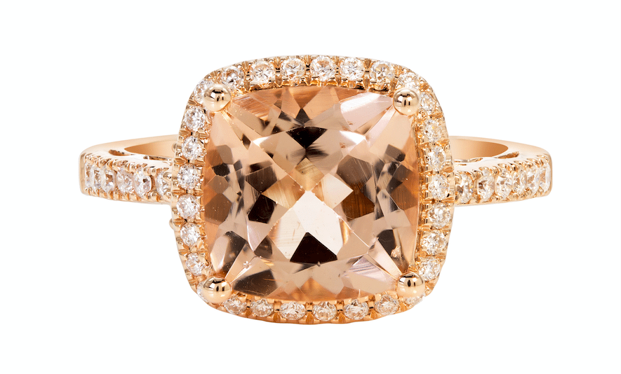 Cushion cut morganite ring rose gold with diamond halo on white isolate
