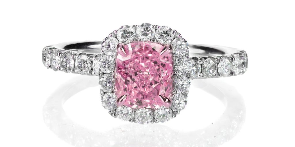 Pink diamond engagement ring with diamond halo and diamond band by diamondport