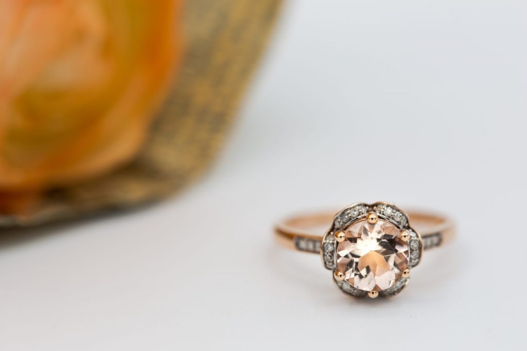 Morganite ring with diamond halo