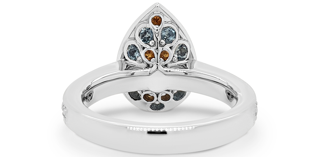 Aquamarine backed white gold engagement ring