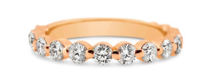 Rosegold half way diamond wedding ring Wedding ring in Rose Gold with half way set diamonds