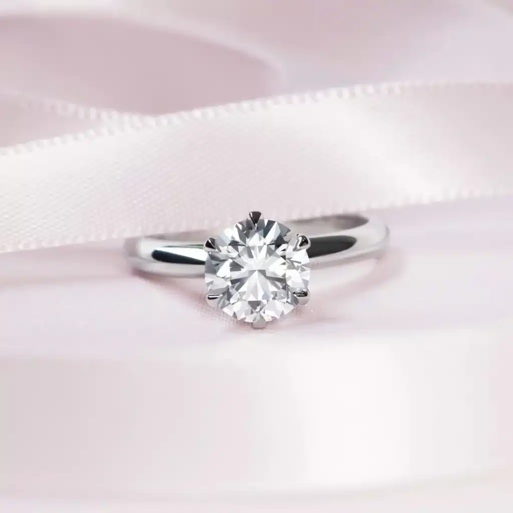 Handmade platinum solitaire engagement ring