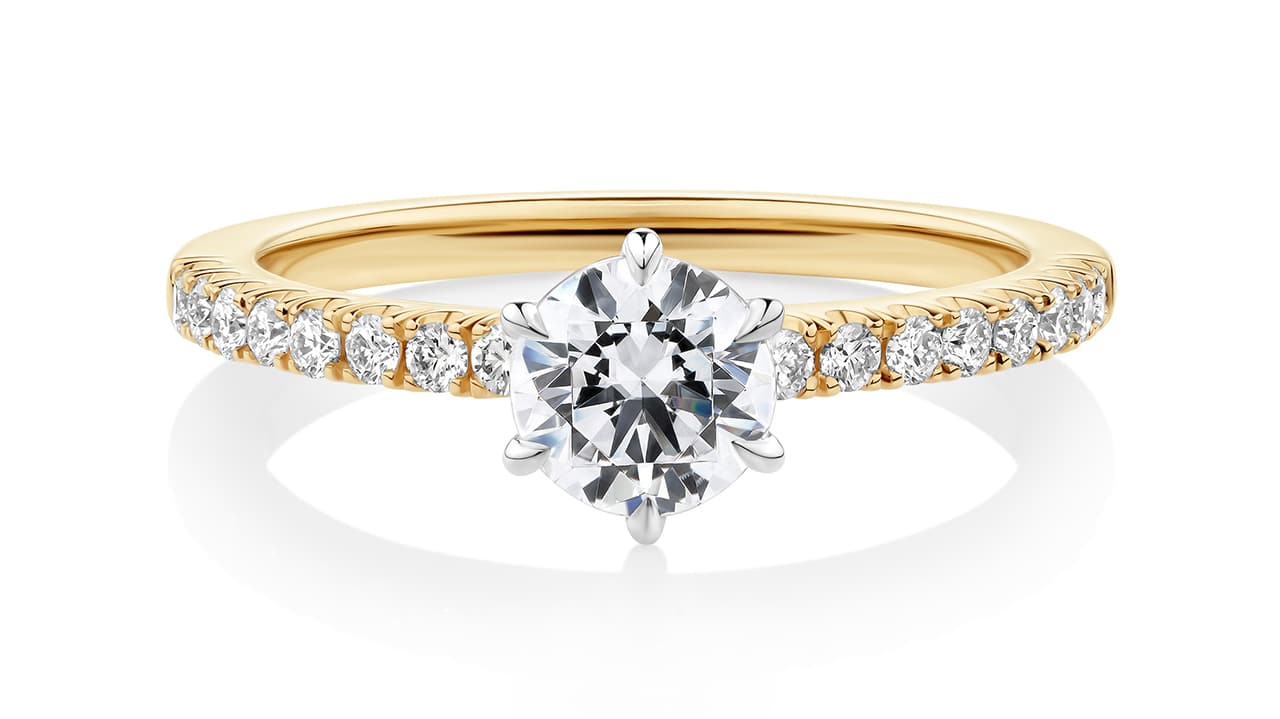 Dianella diamond band with six-claw round brilliant diamond in yellow gold