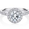 Round brilliant cut diamond halo engagement ring white gold front