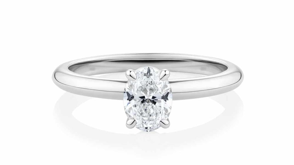 Solitaire oval cut diamond waratah engagement ring in white gold front