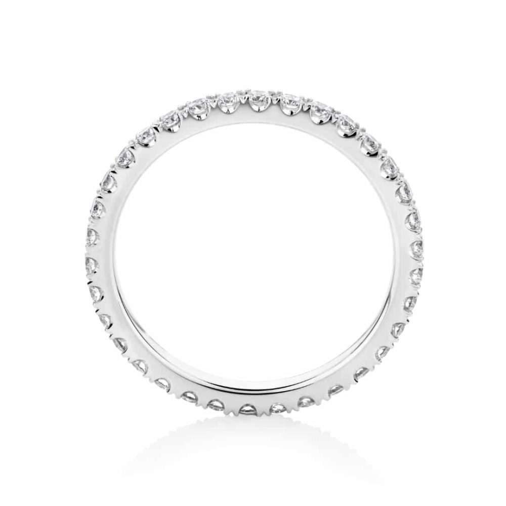 Whitegold wedding ring split claw diamonds sideview