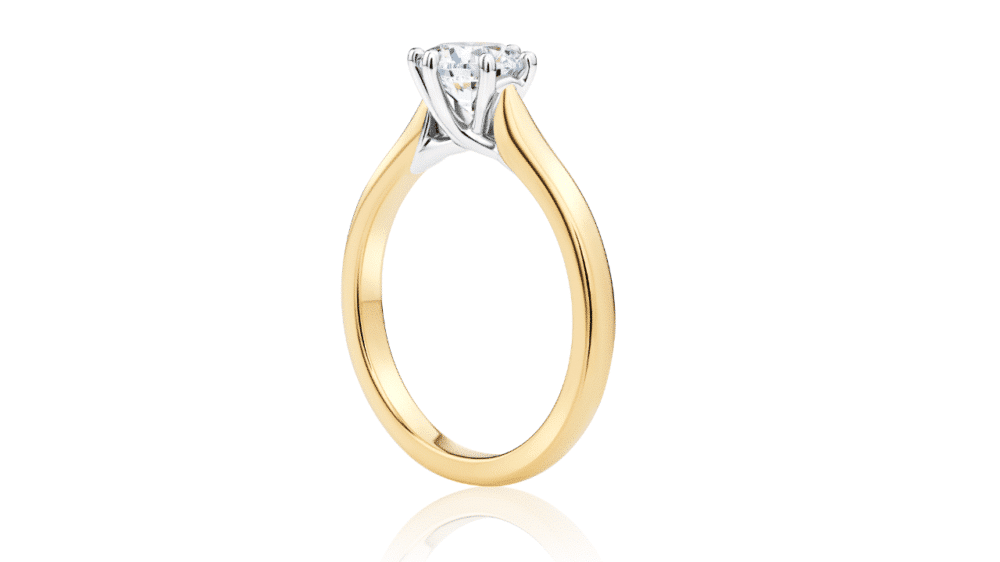 Yellow gold rbc solitaire engagement ring side view
