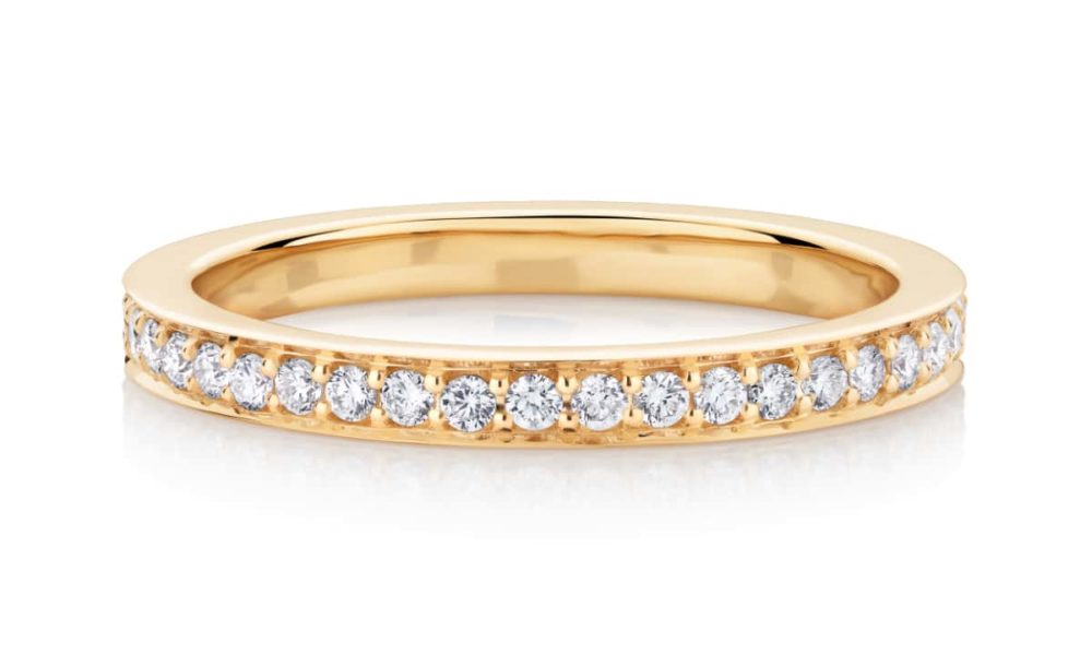 Yellow gold wedding eternity ring grain set diamonds