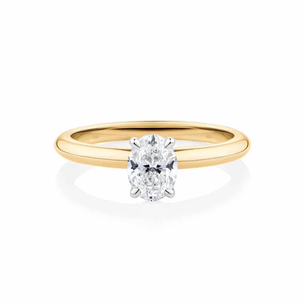 Women's engagement ring oval solitaire yellow gold