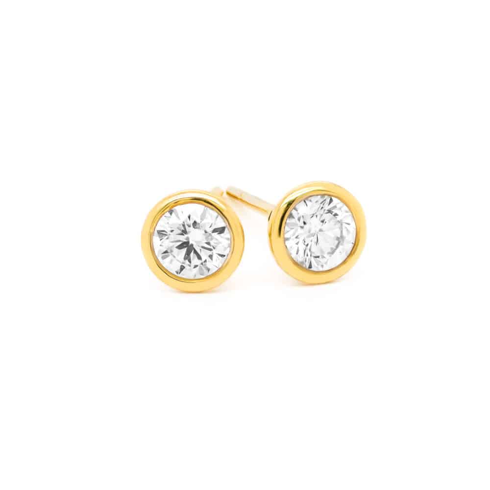 Diamond bezel stud earrings 040ct