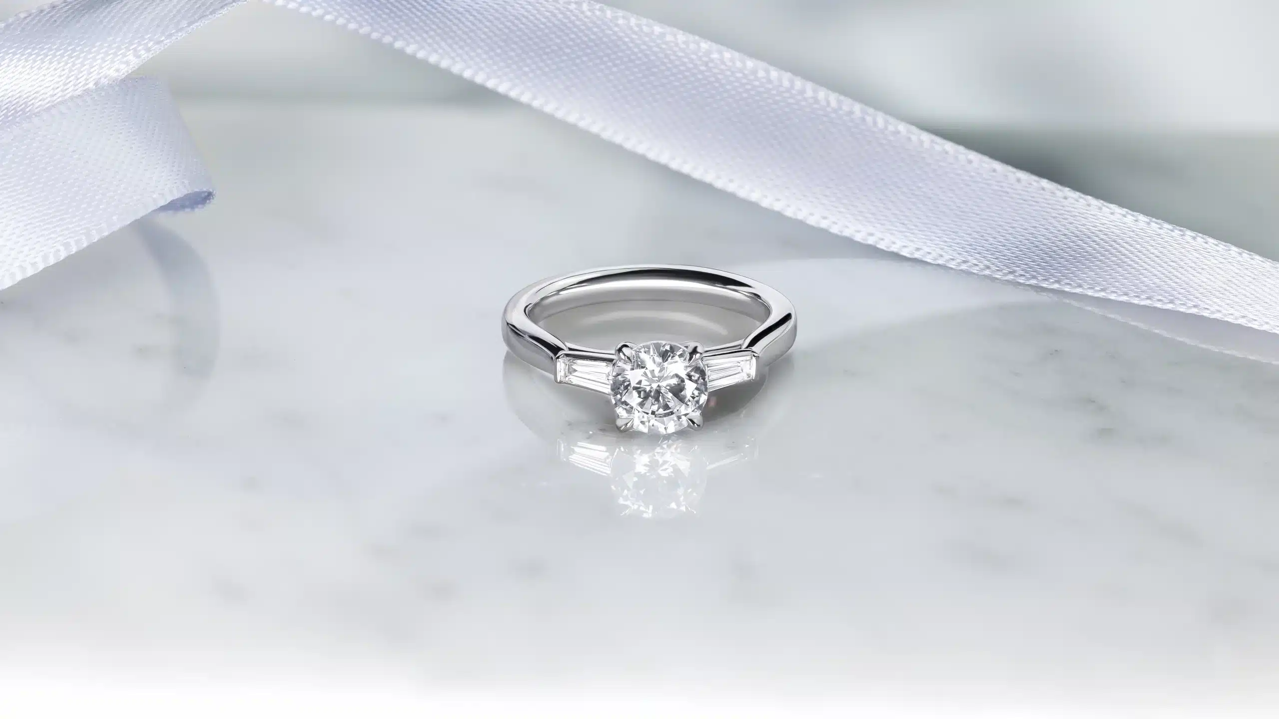 White gold engagement ring with a princess cut design