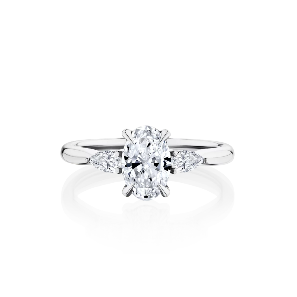 Cyathea-oval-cut-white-gold-trilogy-diamond-engagement-ring