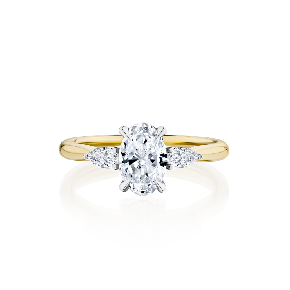 Cyathea-oval-cut-yellow-gold-two-tone-trilogy-diamond-engagement-ring