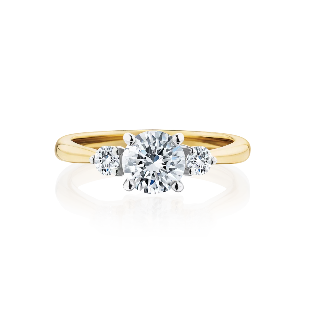 Frangipani-round-cut-yellow-gold-two-tone-trilogy-diamond-engagement-ring