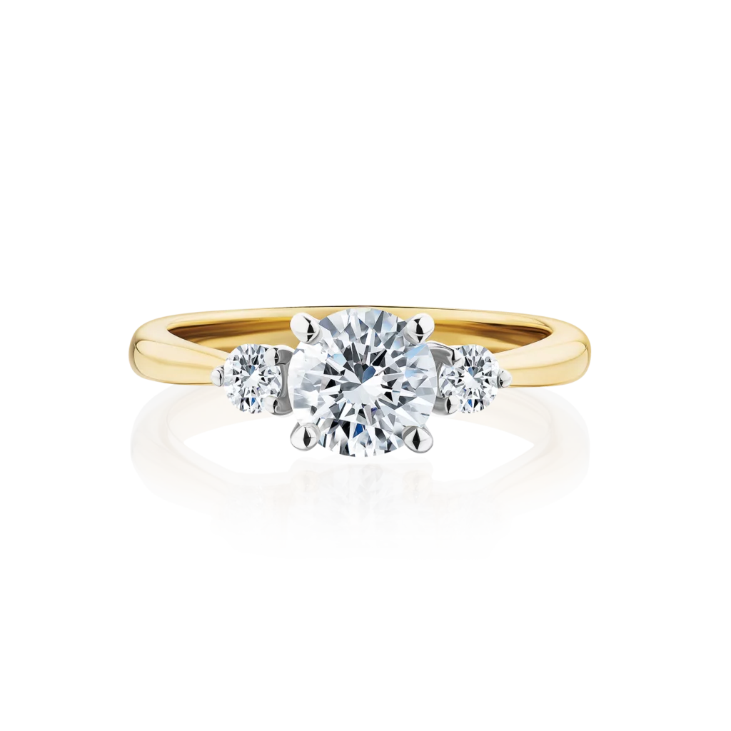 Frangipani-round-cut-yellow-gold-two-tone-trilogy-diamond-engagement-ring
