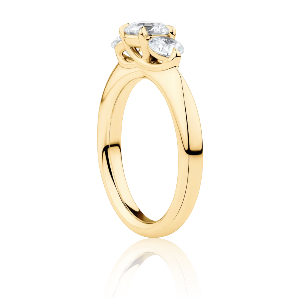 Impressa-side-yellow-gold-round-cut-trilogy-diamond-engagement-ring