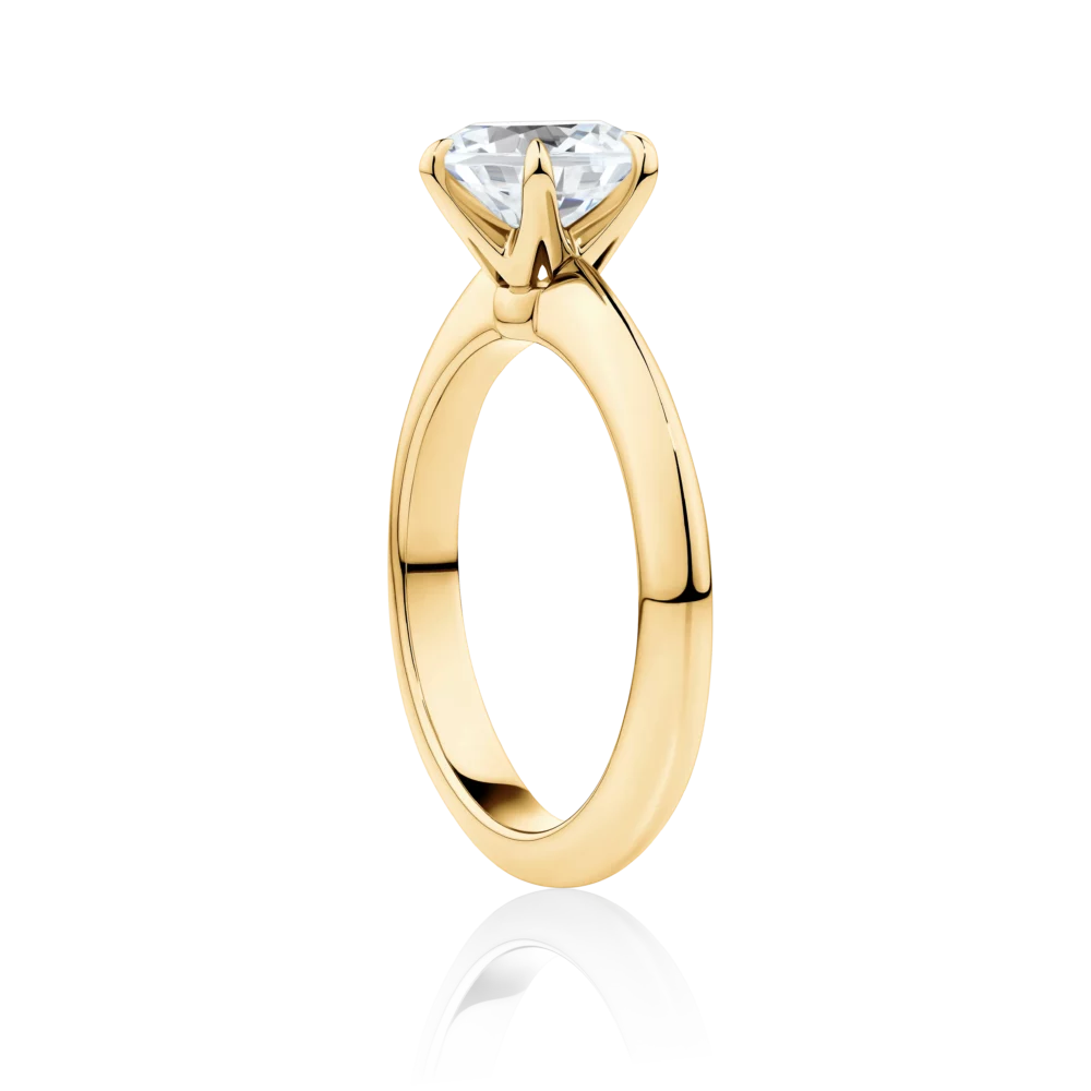 Southern-star-side-yellow-gold-6-claw-round-cut-diamond-engagement-ring