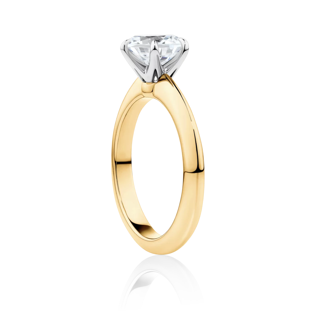 Southern-star-side-yellow-gold-two-tone-6-claw-round-cut-diamond-engagement-ring