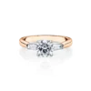 Cyperus-rose-gold-two-tone-trilogy-round-diamond-engagement-ring