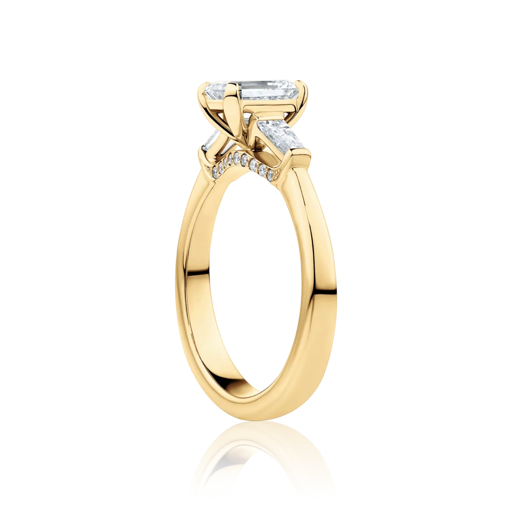 Grevillea-side-yellow-gold-diamond-bridge-trilogy-emerald-diamond-engagement-ring
