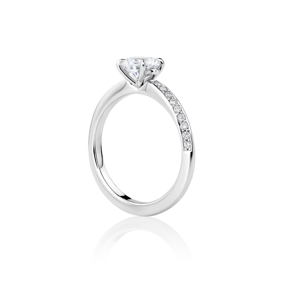 Hibiscus-side-platinum-round-diamond-engagement-ring