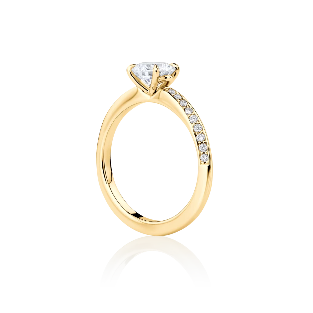 Hibiscus-side-yellow-gold-round-diamond-engagement-ring