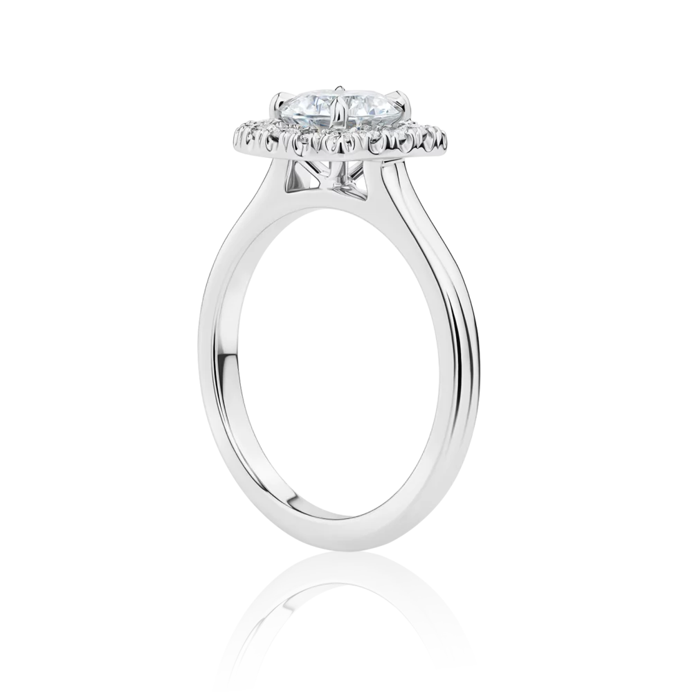 Laurina-side-platinum-halo-round-diamond-engagement-ring