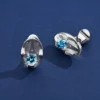 Sterling silver cufflinks-set-with-blue-ascher-cut-zircons-stylistic
