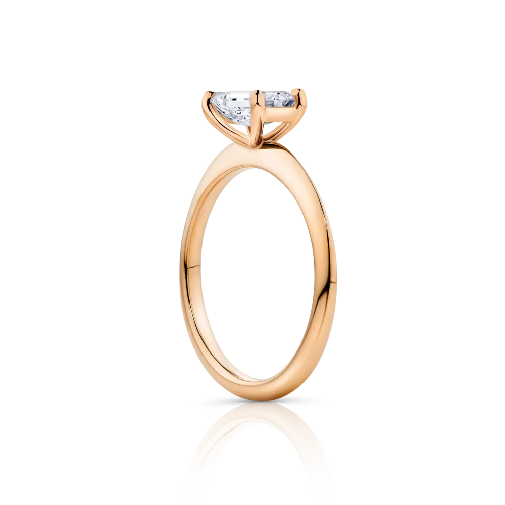 Waratah-emerald-rose-gold-side-emerald-diamond-engagement-ring