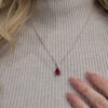 Synthetic Ruby Pendant with Accented Diamond Bail