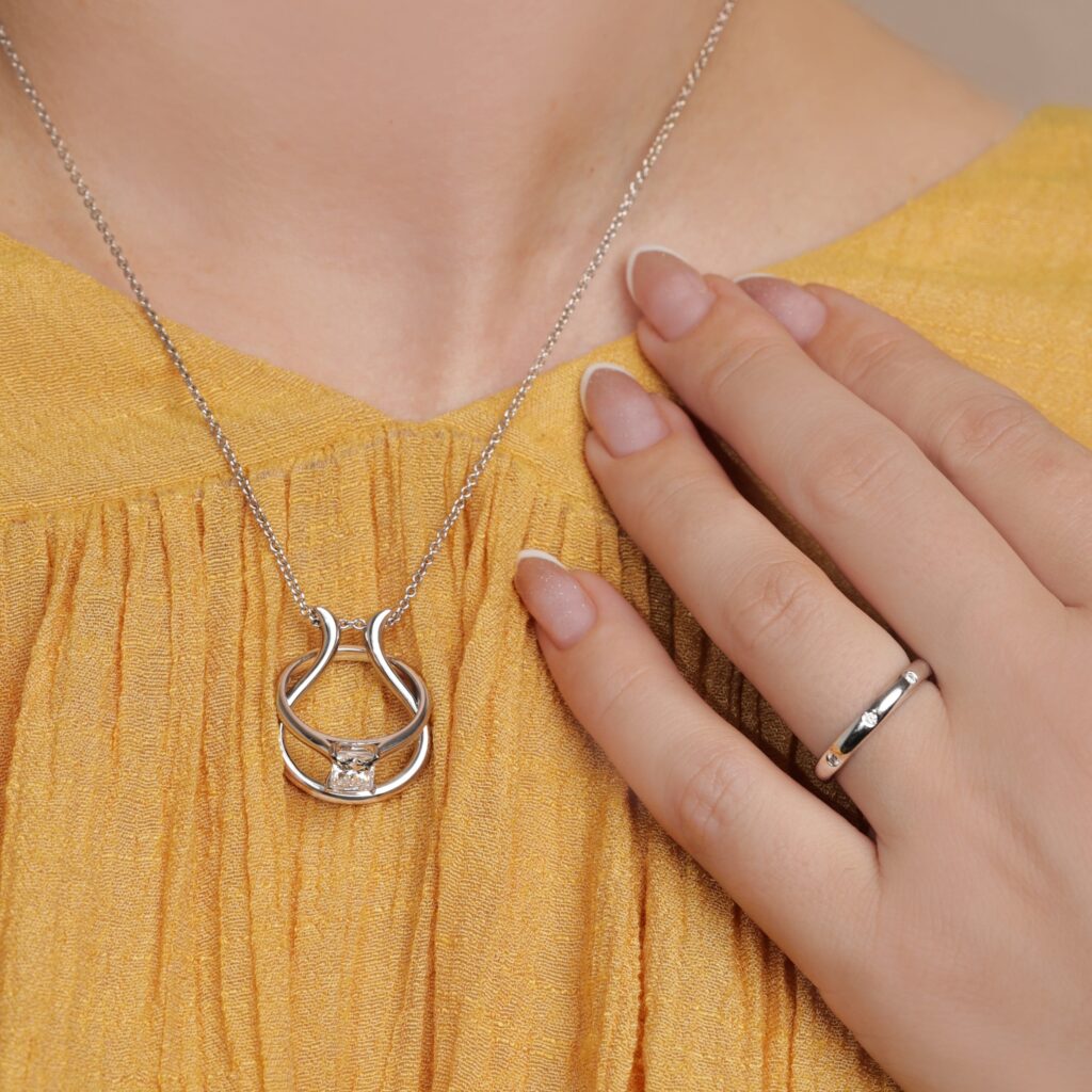 Omega Ring Keeper Pendant and Evelyn White Gold Wedding Ring