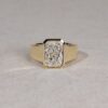 Wide bezel set radiant cut lab diamond ring in yellow gold